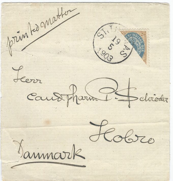 A newspaper wrapper containing a double rate printed matter sent from St.Thomas Maj 19 to Hobro. The stamp shows oval flaw - scrath over TIN in Vestindien. 
There are only 2 newspaper wrappers recorded with a bisected stamp and backstamped. It was mailed 4 days before the bisect usage ceased in St.Thomas. 