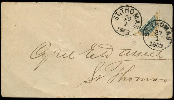 Double cancelled St. Thomas January 20 1903. Local cover - cut open.  Double cancels are rare. Maybe it is due to lack of ink - but it looks as if the cover has been struck by the two different St. Thomas cancels - ST. and ST: (?)