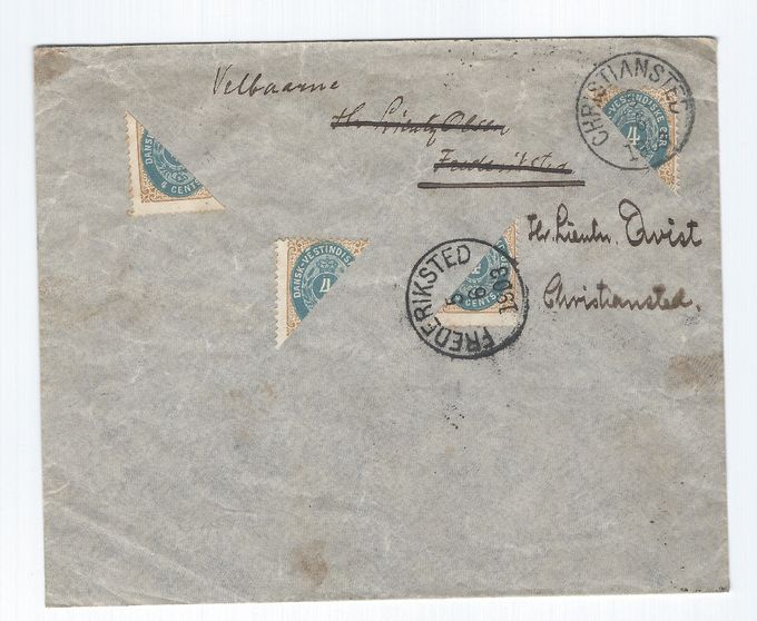Cover sent on June 5 1903 from Christiansted to Frederiksted and returned on the same day. Backstamped Christiansted and Frederiksted June 5. The cover contains 4 bisected stamps originating from two stamps. A very rare cover.